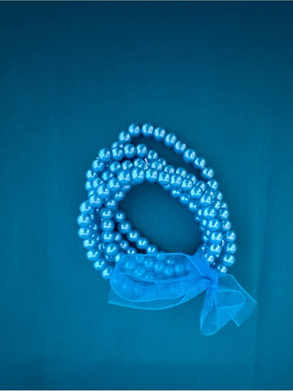 Layered Blue Beaded Necklace with Bow
